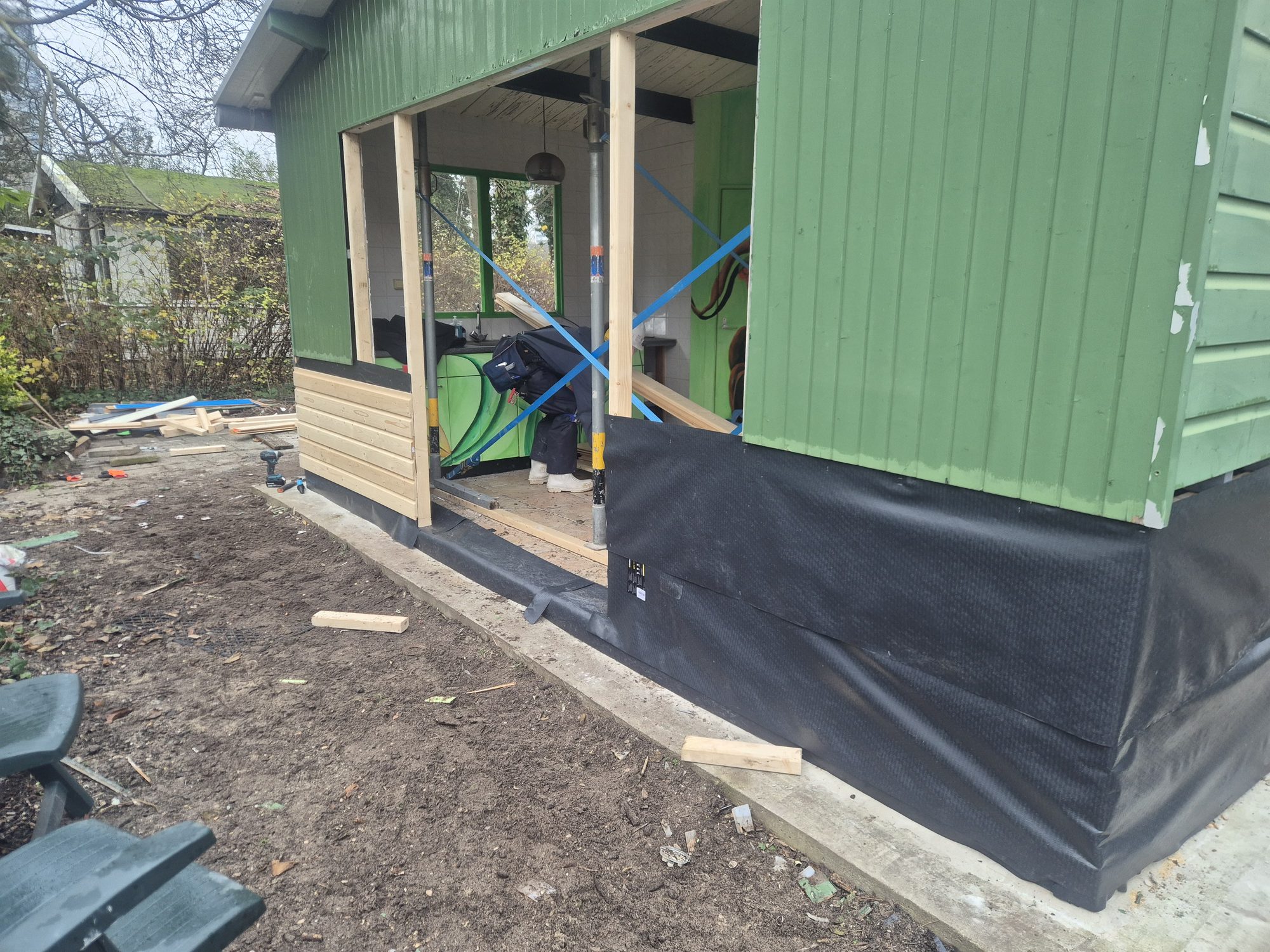 Green shed cladding work