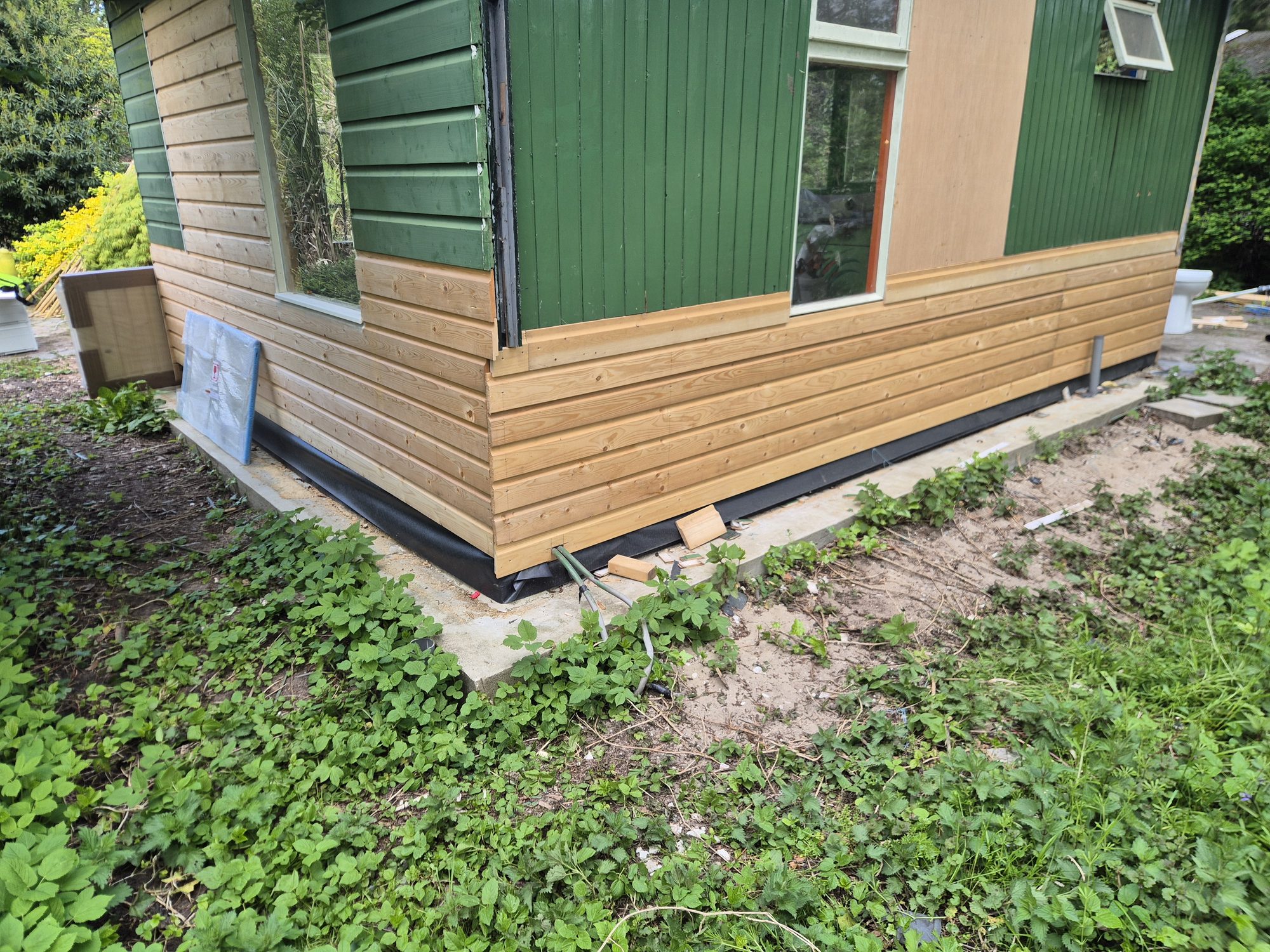 Finished green shed exterior detail