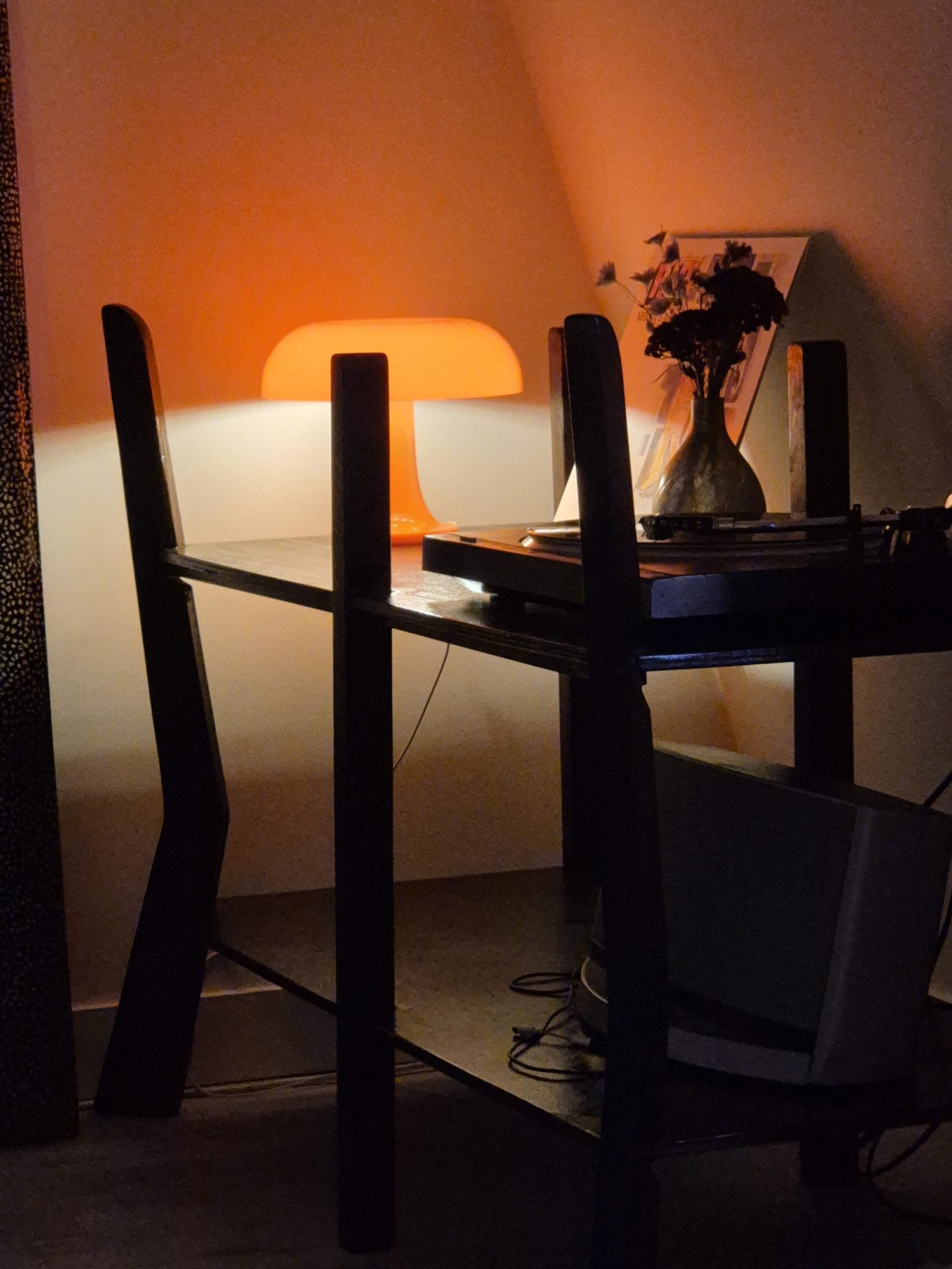 Custom table frame shown with warm mood lighting