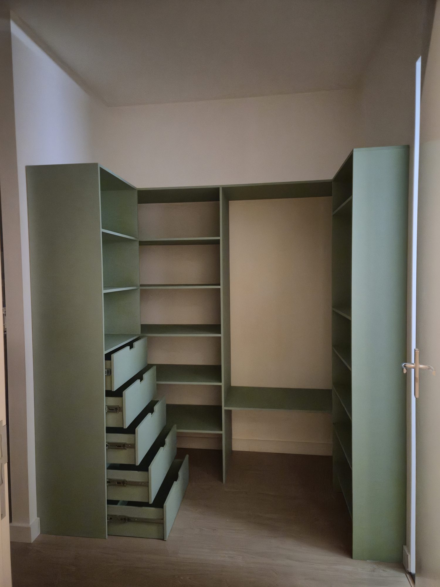 Finished light green custom cabinet