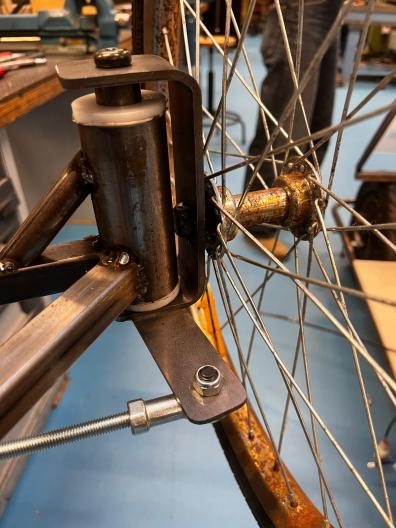 Close-up of a wheel and frame connection